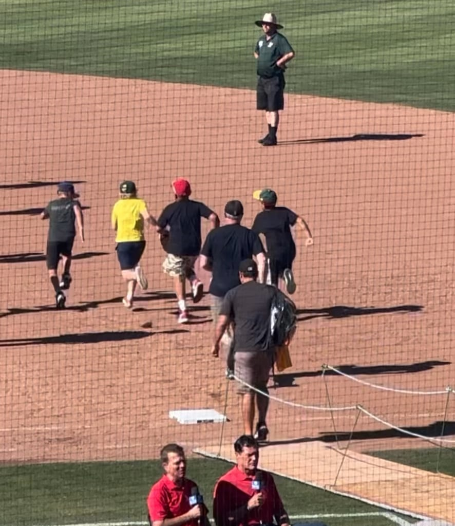 My son gets exposed as an Angels fan running the bases at the Athletics game