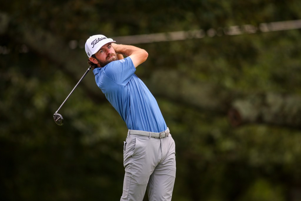 Cameron Young taking a shot during the final round of the TOUR Championship.