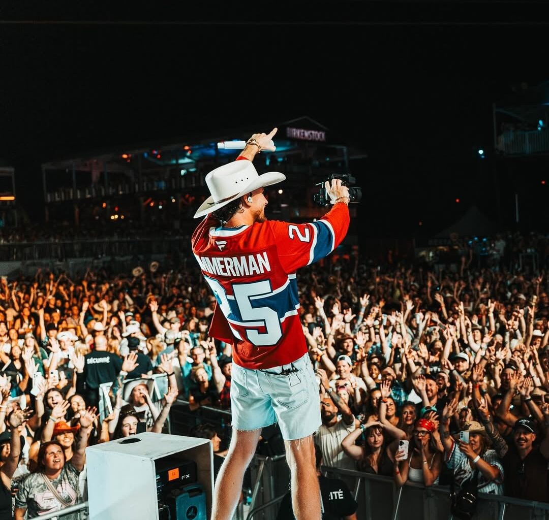 Bailey Zimmerman wearing a habs jersey at the concert in Montreal