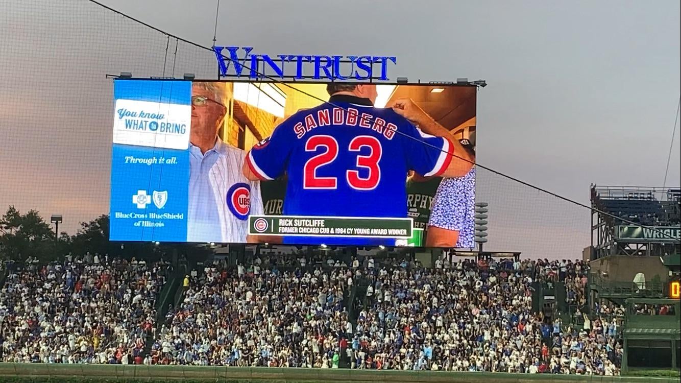 Rick Sutcliffe throws starting pitch and honors Ryno
