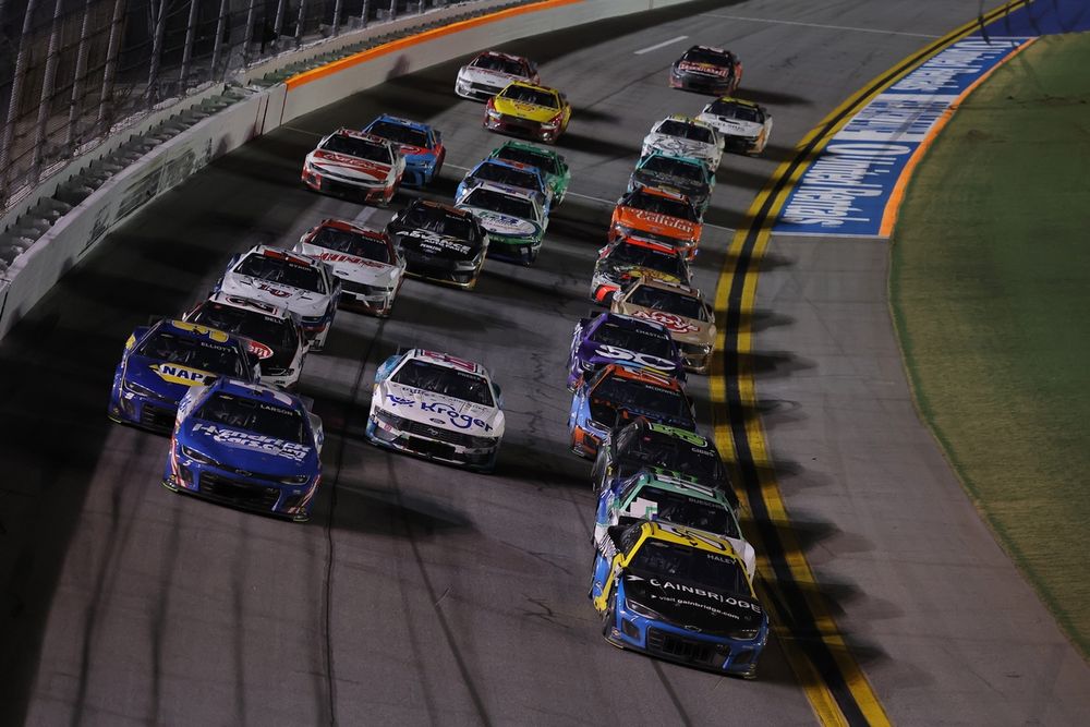 The field races to two laps to go