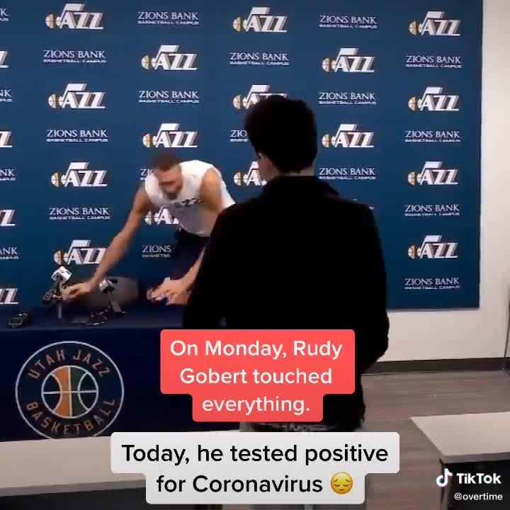 Rudy Gobert touches the microphones during the Covid-19 pandemic, soon before testing positive for Covid-19