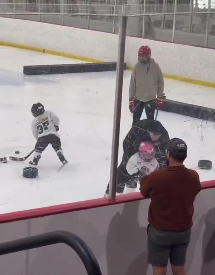Andrei Svechnikov teaching kids how to deke