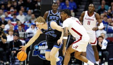 Mar 27, 2025; Newark, NJ, USA; Brigham Young Cougars forward Richie Saunders (15) steals the ball against Alabama Crimson Tide guard Labaron Philon (0) during the first half during an East Regional semifinal of the 2025 NCAA tournament at Prudential Center. Mandatory Credit: Vincent Carchietta-Imagn Images
