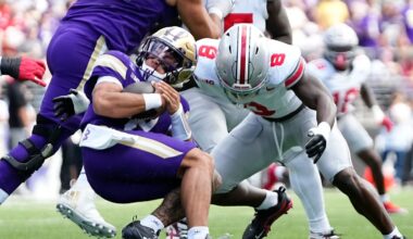 Ohio State Buckeyes linebacker Arvell Reese (8) tackles Washington Huskies quarterback Demond Williams Jr. (2) during the first half of the NCAA football game at Husky Stadium in Seattle on Sept. 27, 2025.