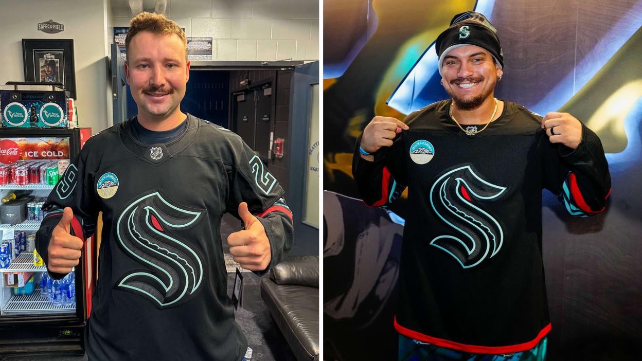 Cal Raleigh and Josh Naylor wearing the new Kraken alternate jerseys