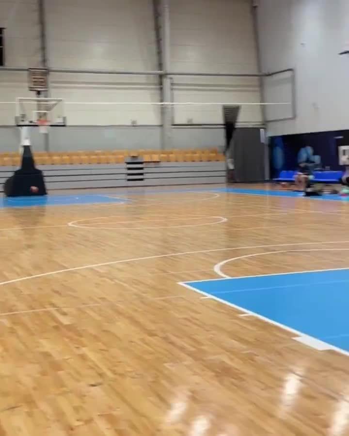 Barefoot Luka Doncic makes two 3-pointers in a row while sitting on the bench