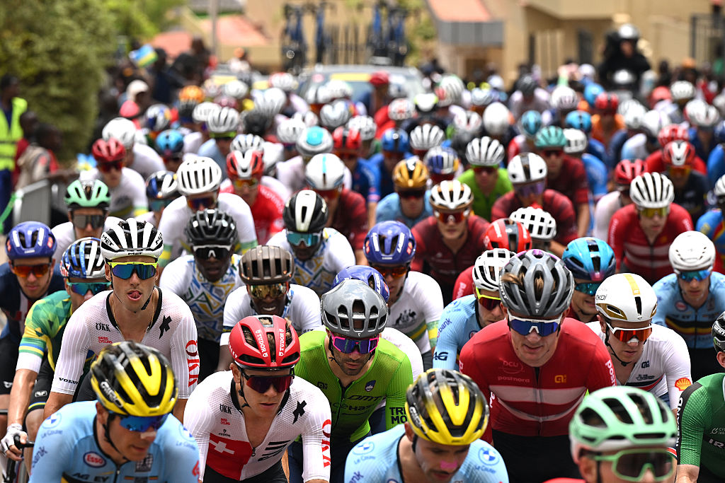 KIGALI, RWANDA - SEPTEMBER 28: Luka Mezgec and Team Slovenia and a general view of the peloton competing during the 98th UCI Cycling World Championships Kigali 2025, Men Elite Road Race a 267.5km race from Kigali to Kigali on September 28, 2025 in Kigali, Rwanda. (Photo by Dario Belingheri/Getty Images)