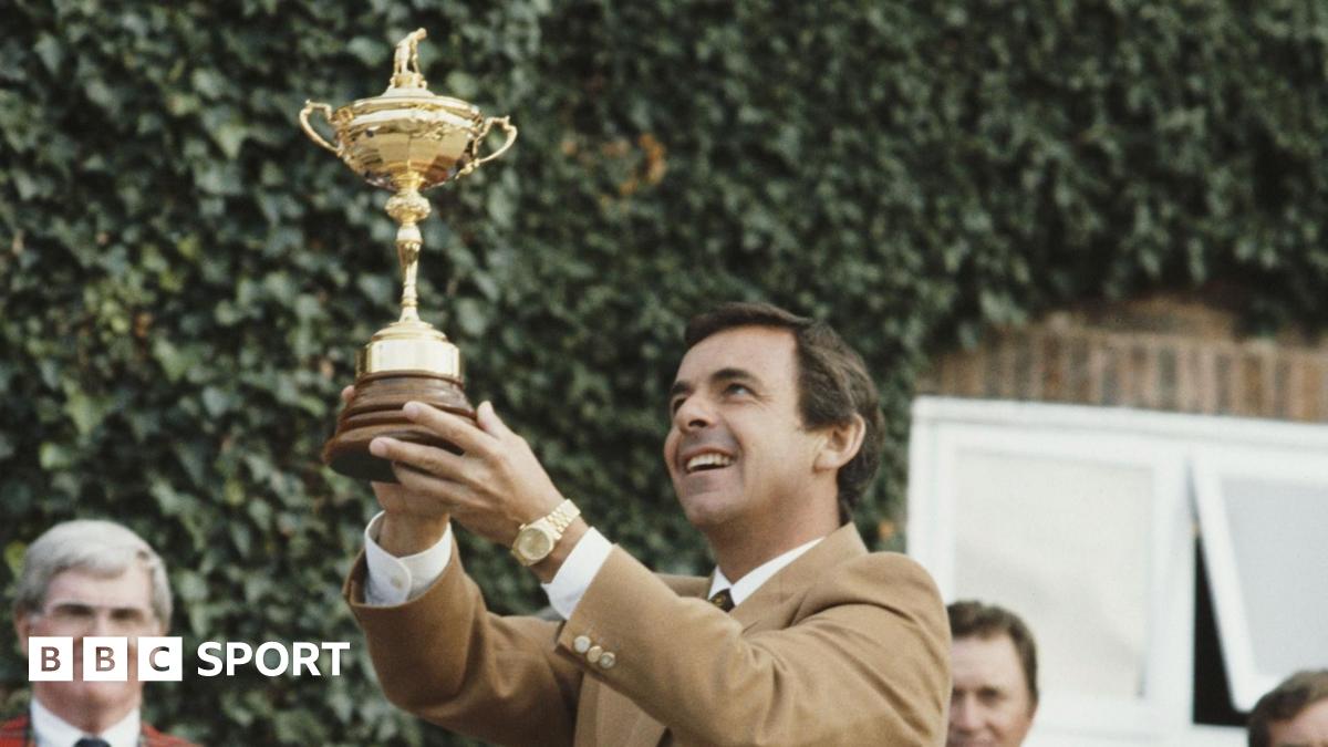 Europe captain Tony Jacklin raises the Ryder Cup after winning for the first time at The Belfry in 1985