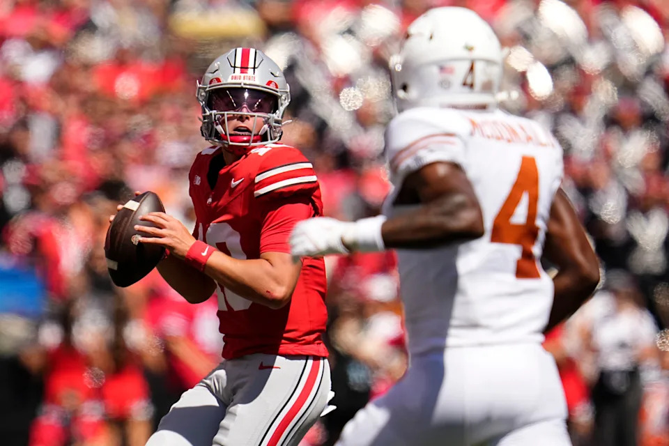 Ohio State quarterback Julian Sayin looks to pass over Texas defensive back Jelani McDonald.