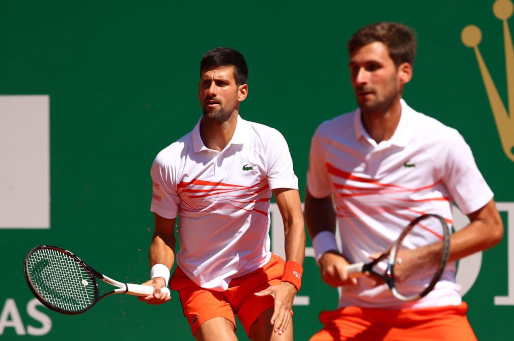 Novak Djokovic and Marko Djokovic in action at the 2019 Monte-Carlo Masters