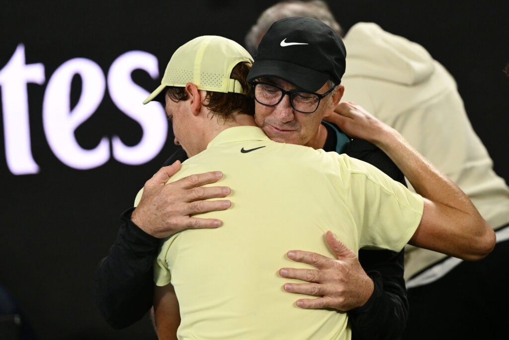 Jannik Sinner and Darren Cahill embrace after the 2025 Australian Open final