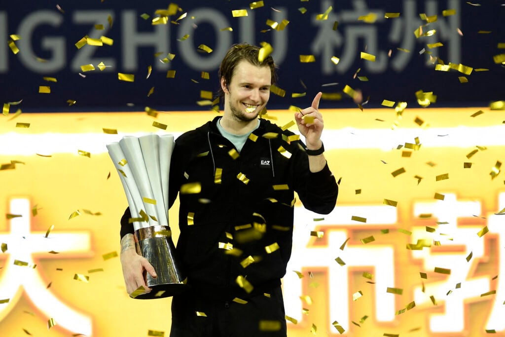 Alexander Bublik celebrates with the title after winning the 2025 Hangzhou Open