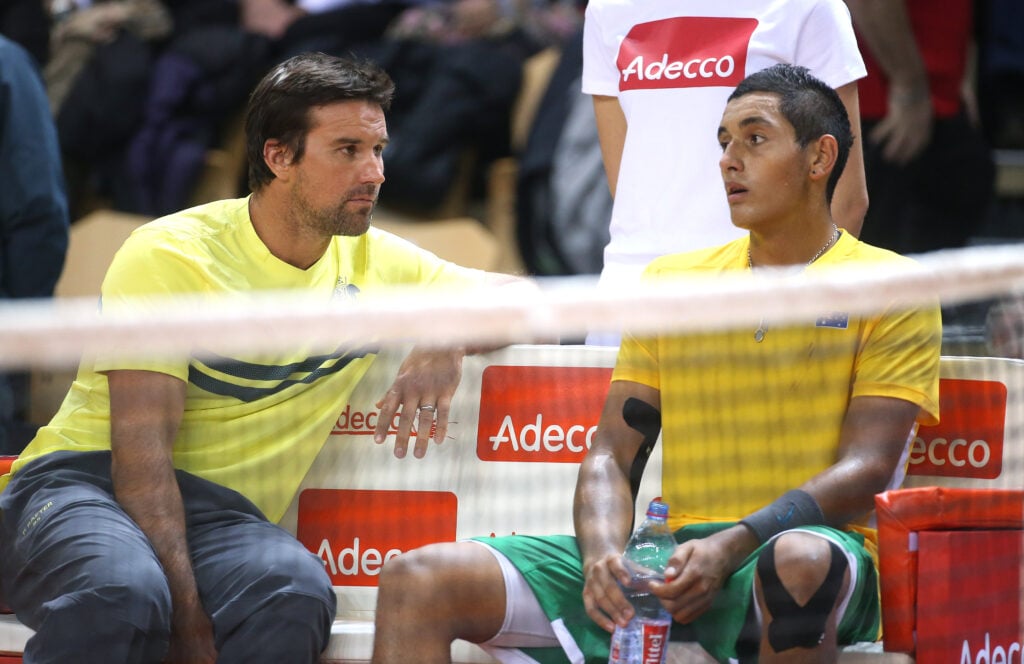 Patrick Rafter, captain of Australia chats with Nick Kyrgios during the 1st round Davis Cup tie between France and Australia at the Vendespace stadium.