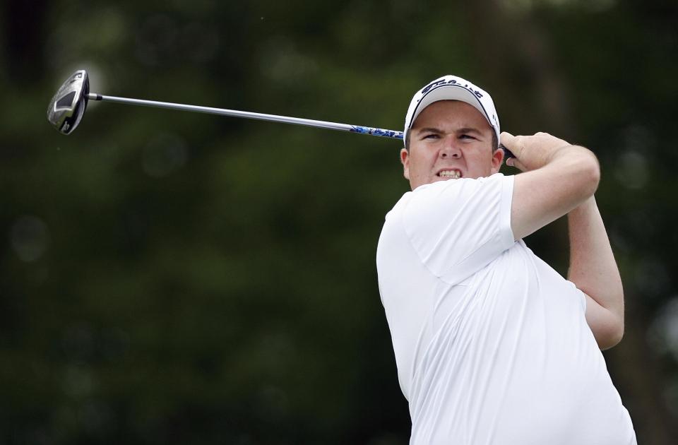 Irish golfer Shane Lowry watches his drive from the 4th tee during the first day of the European Open at the London Club in Ash in Kent, south-east England, on May 28, 2009. AFP PHOTO/Glyn Kirk (Photo credit should read GLYN KIRK/AFP via Getty Images)