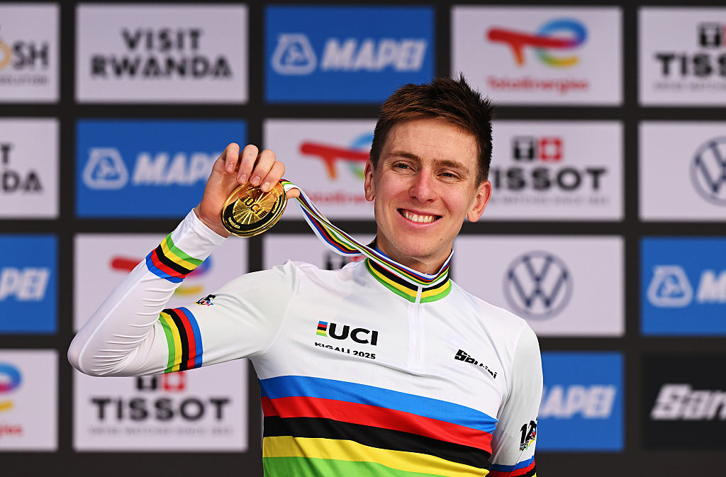 KIGALI, RWANDA - SEPTEMBER 28: Gold medalist Tadej Pogacar and Team Slovenia celebrates winning during the medal ceremony after the 98th UCI Cycling World Championships Kigali 2025, Men Elite Road Race a 267.5km race from Kigali to Kigali on September 28, 2025 in Kigali, Rwanda. (Photo by Dario Belingheri/Getty Images)