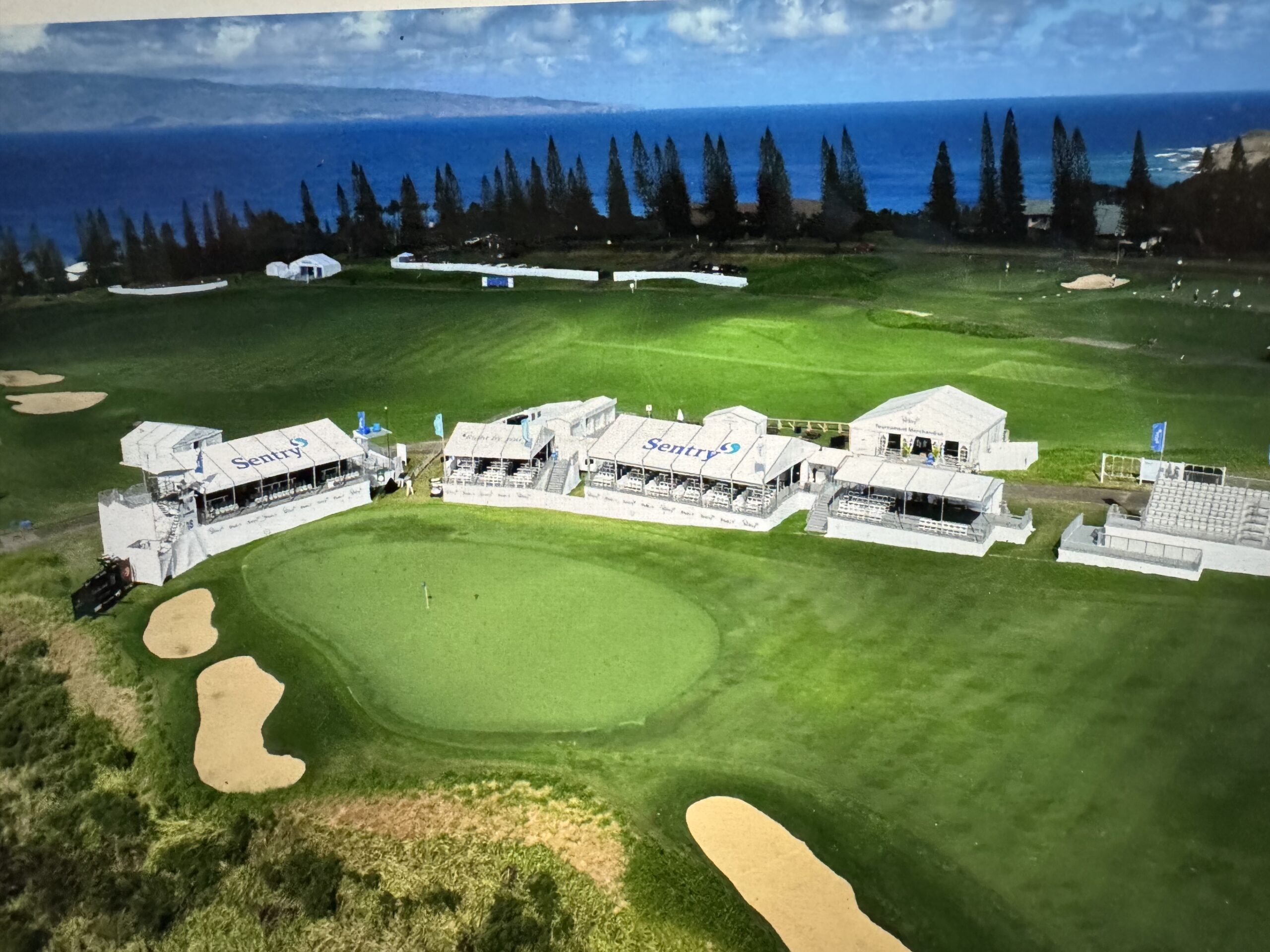 This screenshot photo shows the 18th green (left foreground) and the first fairway at the Kapalua Plantation Course just prior to The Sentry PGA Tour golf tournament played Jan. 2-5, 2025.