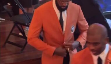 LeBron James receives his Hall of Fame orange jacket as a member of the 'Redeem Team'