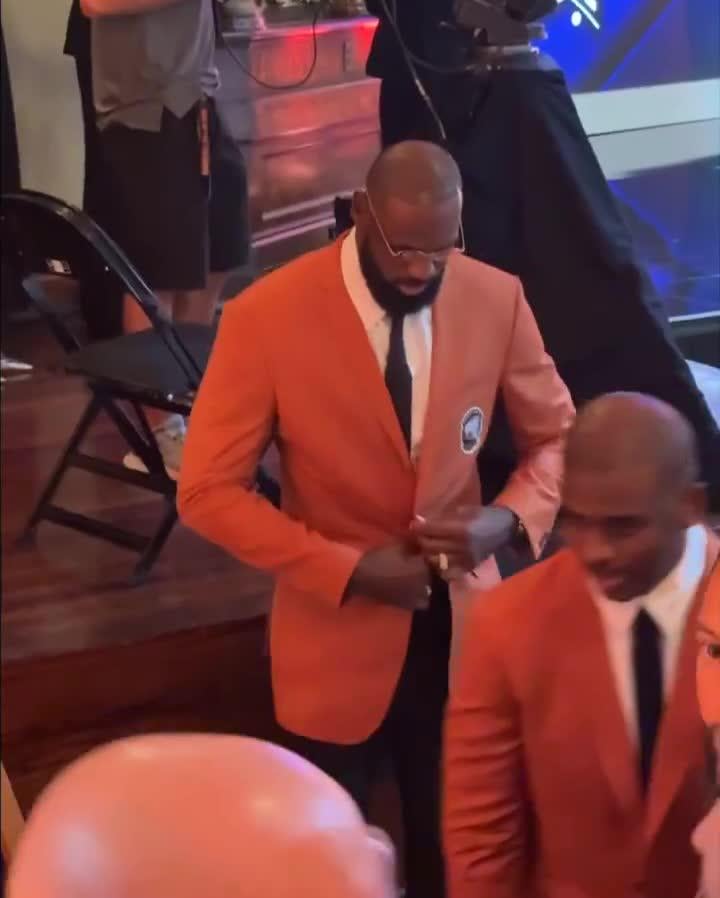 LeBron James receives his Hall of Fame orange jacket as a member of the 'Redeem Team'