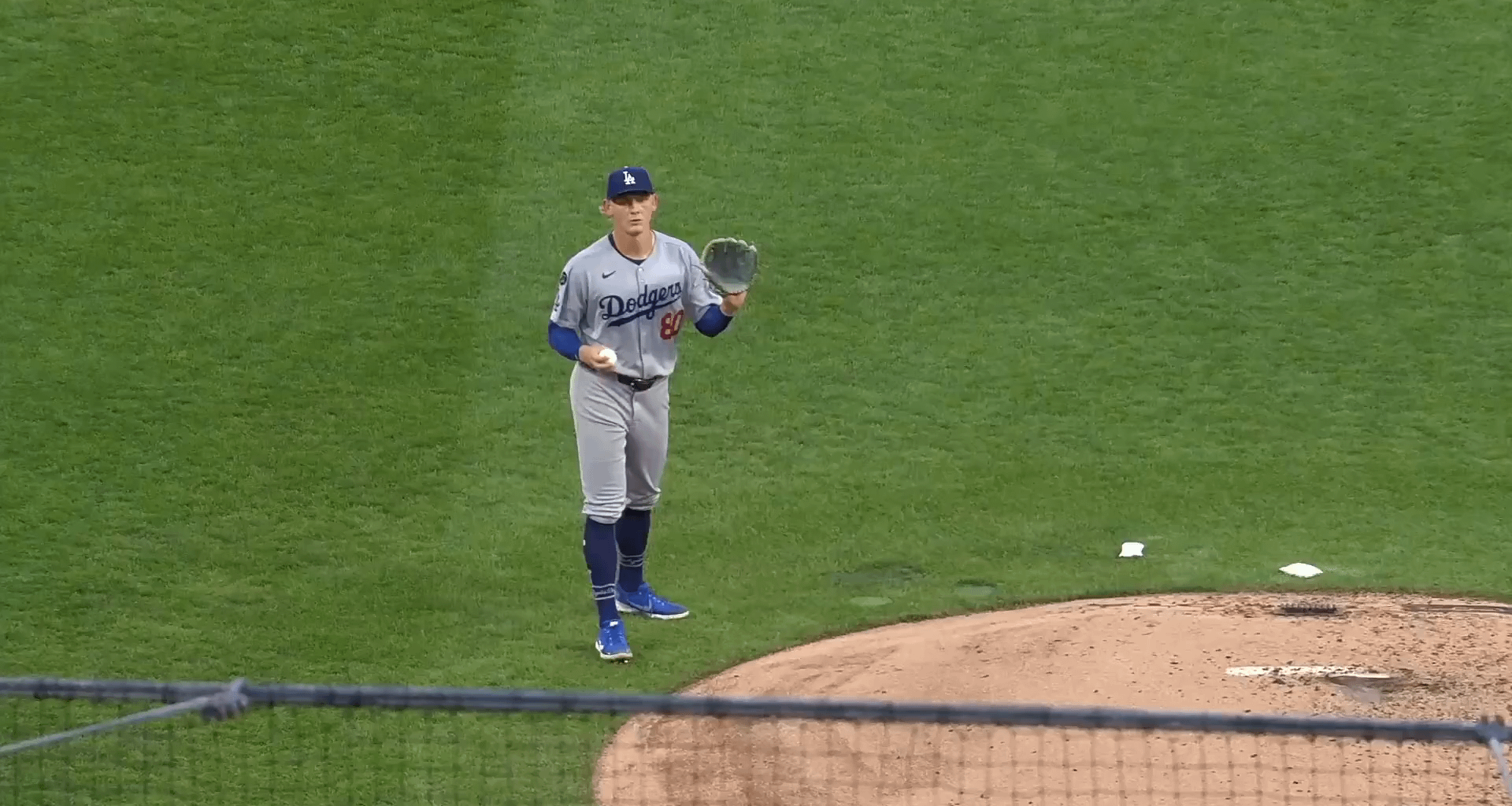 [Highlight] Slow-mo replay showing Dodgers pitcher Emmet Sheehan intentionally keeping the first MLB hit ball for Cam Devanney and throwing the Pirates a different ball.