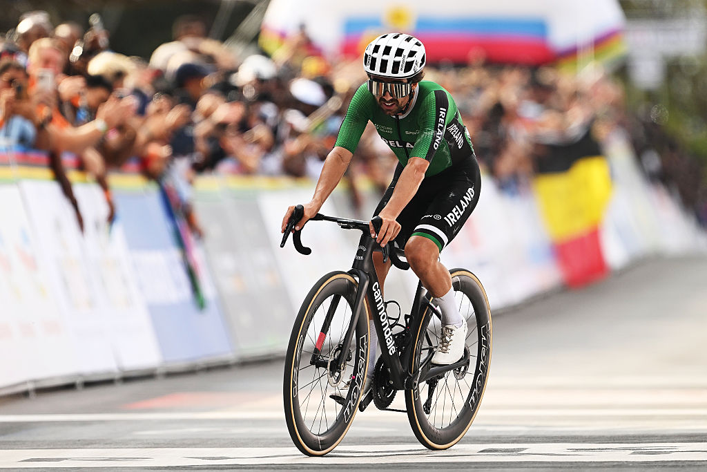 KIGALI, RWANDA - SEPTEMBER 28: Bronze medalist Ben Healy and Team Ireland crosses the finish line during the 98th UCI Cycling World Championships Kigali 2025, Men Elite Road Race a 267.5km race from Kigali to Kigali on September 28, 2025 in Kigali, Rwanda. (Photo by Dario Belingheri/Getty Images)