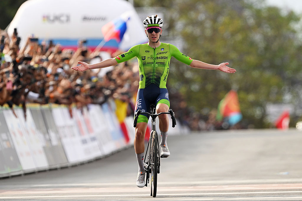 KIGALI, RWANDA - SEPTEMBER 28: Gold medalist Tadej Pogacar and Team Slovenia celebrates winning during the 98th UCI Cycling World Championships Kigali 2025, Men Elite Road Race a 267.5km race from Kigali to Kigali on September 28, 2025 in Kigali, Rwanda. (Photo by Dario Belingheri/Getty Images)