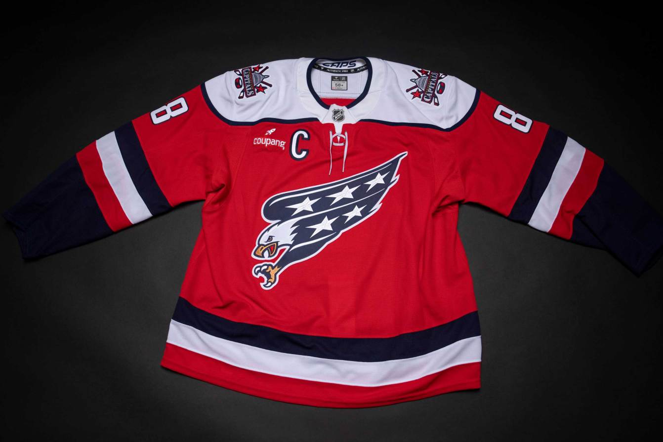 The front of the Washington Capitals' third jersey featuring the Screaming Eagle in red, white, and blue