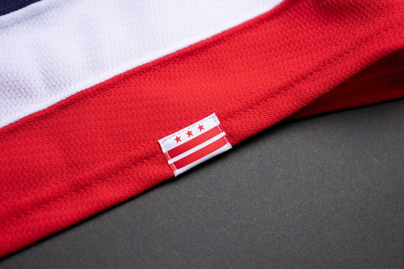 The DC Flag as a loop label on the back hem o the Washington Capitals' third jersey