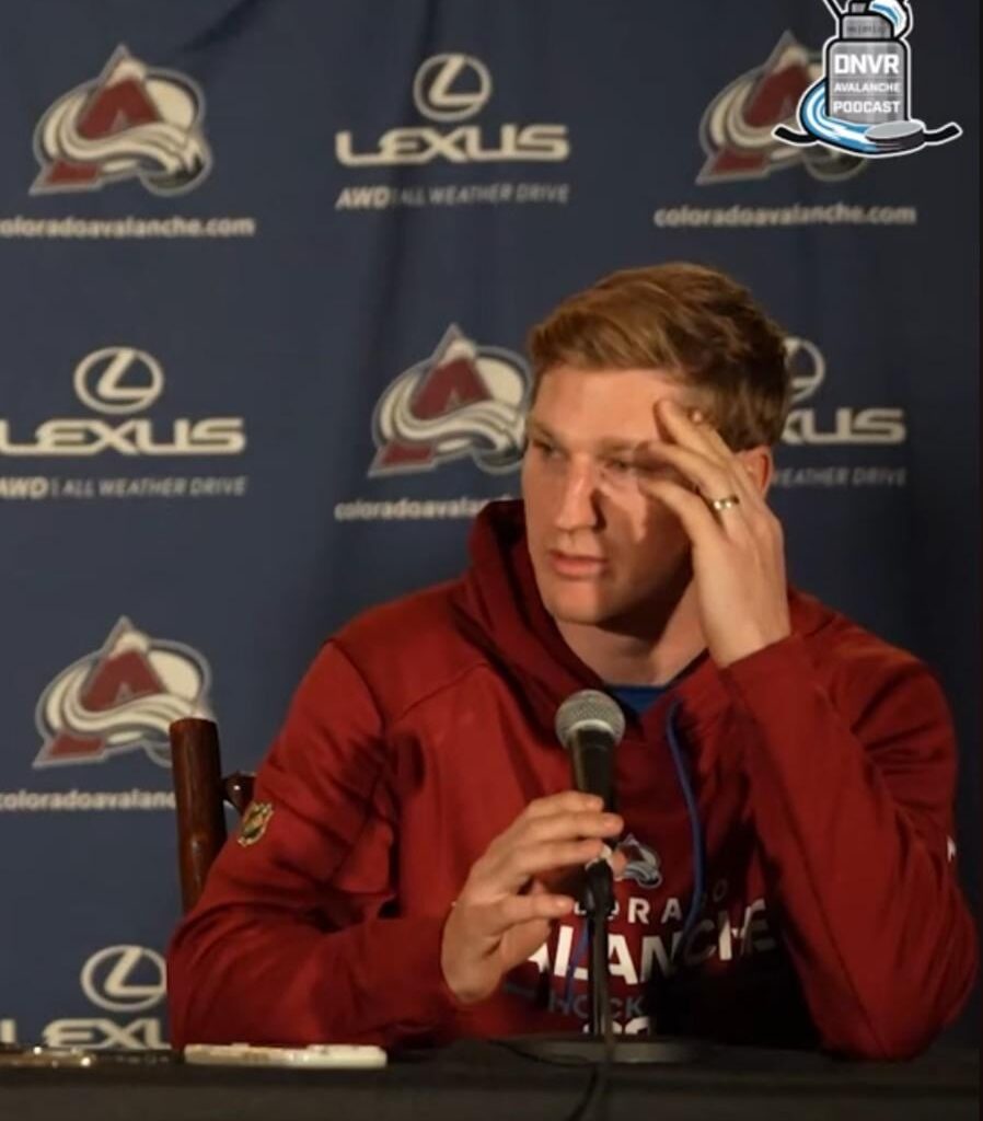 Is that a WEDDING BAND I see on MacKinnon's hand?? Talk about a low profile - there's more news about him eating pasta than getting married