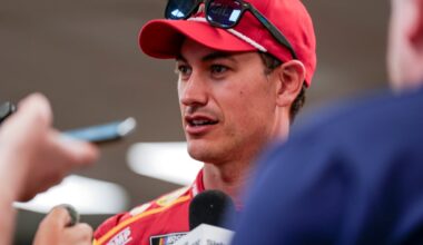 An image of NASCAR driver Joey Logano talking to the media