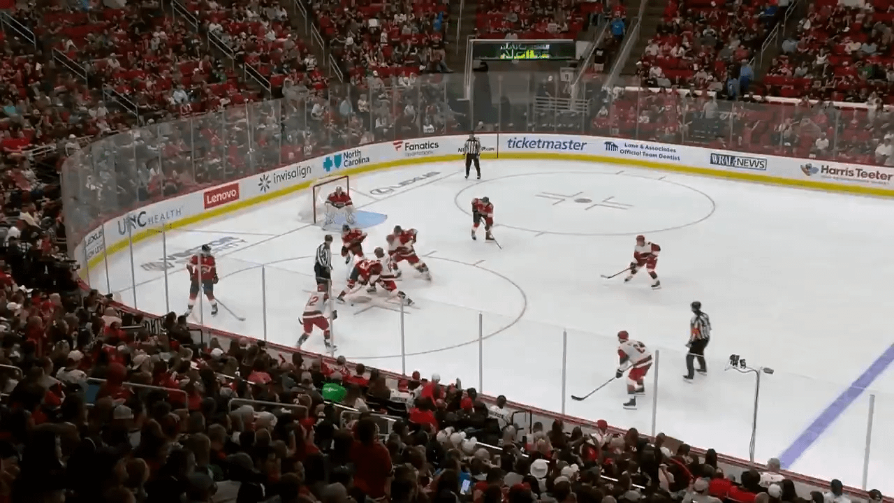 As Ryan Suzuki opens the scoring for Carolina, ex-Panther enforcer Givani Smith goes at it with Ben Harpur.