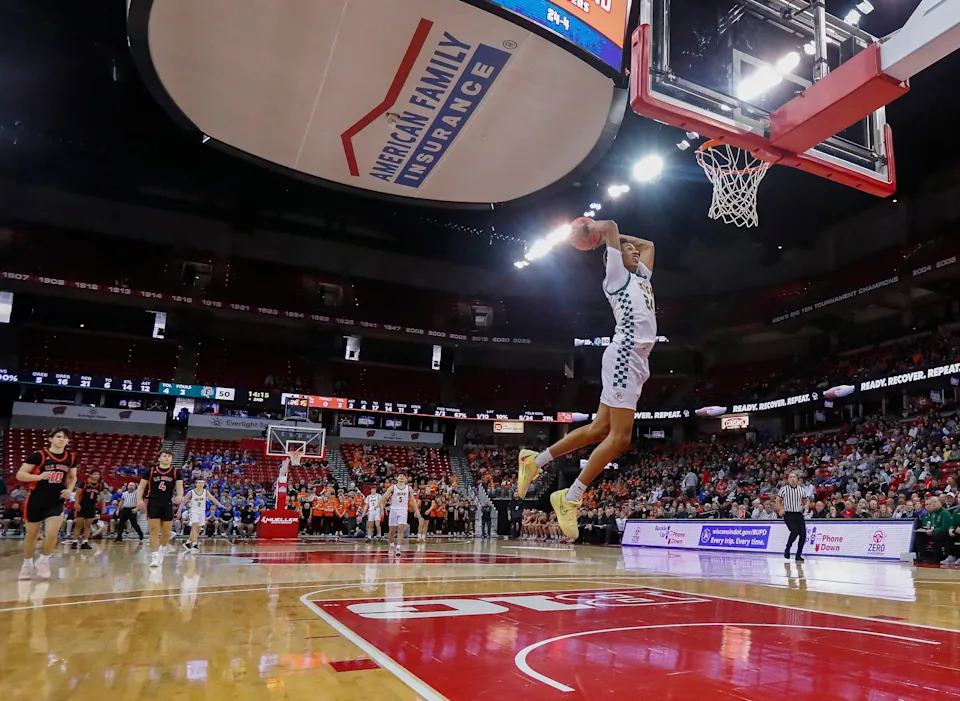 Freedom High School's Donovan Davis (24) goes up for a fast break dunk against Elk Mound High School during a WIAA Division 3 state semifinal game on Thursday, March 20, 2025, at the Kohl Center in Madison, Wis. Freedom won the game, 66-32.
Tork Mason/USA TODAY NETWORK-Wisconsin