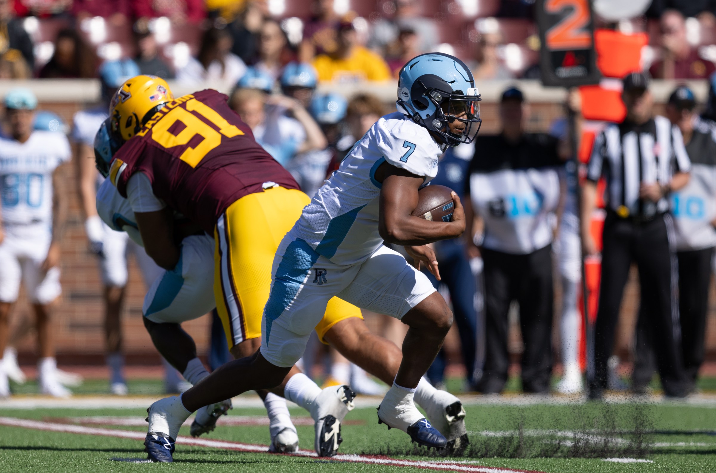 MINNEAPOLIS, MN - SEPTEMBER 07: Rhode Island Rams quarterback Devin Farrell (7) runs with the ball during the college football game between the Rhode Island Rams and the Minnesota Golden Gophers on September 7, 2024, at Huntington Bank Stadium in Minneapolis, MN. (Photo by Bailey Hillesheim/Icon Sportswire via Getty Images)