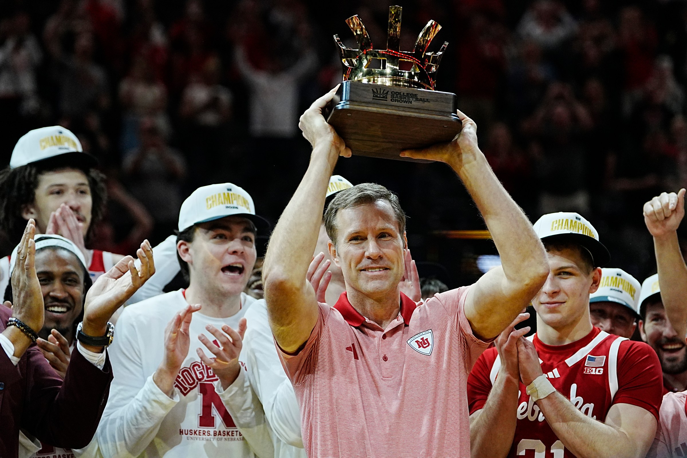 LAS VEGAS, NEVADA - APRIL 06: Head coach Fred Hoiberg of the Nebraska Cornhuskers hoists the Crown Championship trophy following the championship game of the College Basketball Crown tournament between the Nebraska Cornhuskers and the UCF Knights T-Mobile Arena on April 06, 2025 in Las Vegas, Nevada. The Cornhuskers defeated the Knights 77-66. (Photo by Louis Grasse/Getty Images)