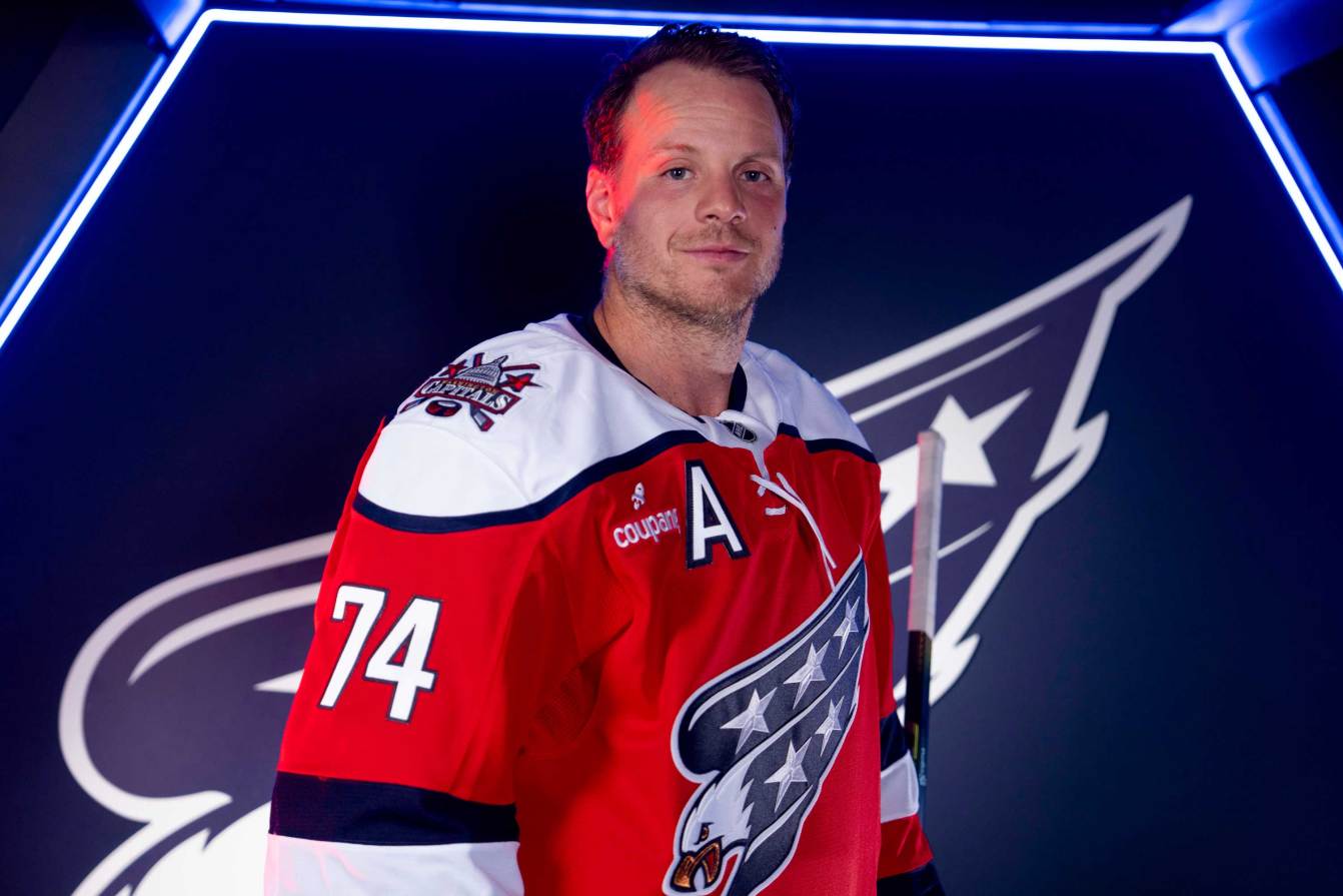 John Carlson wearing the Washington Capitals' Screaming Eagle third jersey in red, white, and blue