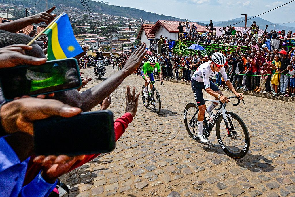 Slovenian Tadej Pogacar and Mexican Isaac Del Toro pictured in action during the elite men road race (267,5 km) at the cycling road World Championships in Kigali, Rwanda, Sunday 28 September 2025. The 2025 UCI Road World Championships take place from 21 to 28 September in Kigali, Rwanda. BELGA PHOTO DIRK WAEM (Photo by DIRK WAEM / BELGA MAG / Belga via AFP)
