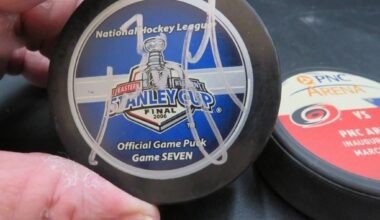 What about this one? 2006 Game 7 puck, I have no clue...