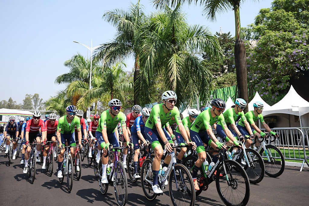 Slovenian riders cycle at the start of the men's Elite road race cycling event during the UCI 2025 Road World Championships, in Kigali, on September 28, 2025. (Photo by Anne-Christine POUJOULAT / AFP)