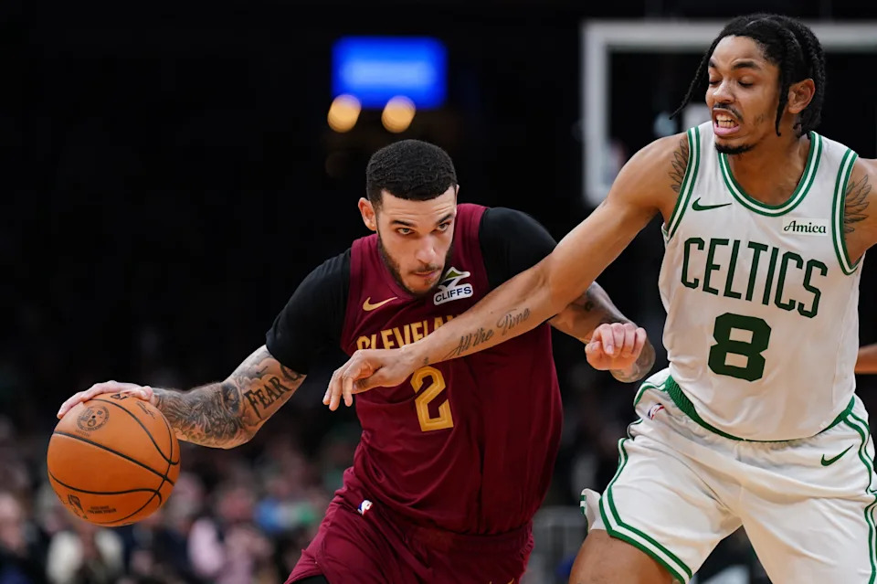 Oct 29, 2025; Boston, Massachusetts, USA; Cleveland Cavaliers guard Lonzo Ball (2) drives the ball against Boston Celtics forward Josh Minott (8) in the second half at TD Garden. Mandatory Credit: David Butler II-Imagn Images