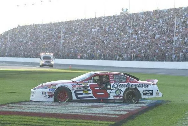 15 Feb 2004: Dale Earnhardt Jr. does doughnuts in the infield after winning the Daytona 500 at Daytona International Speedway in Daytona Beach, FL.