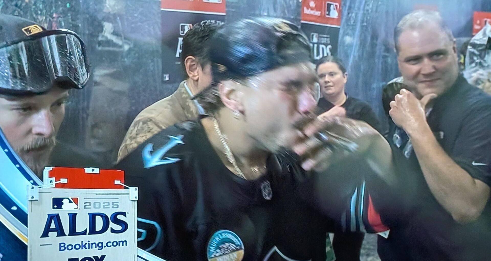 Josh Naylor celebrating the ALDS win in a Kraken sweater!