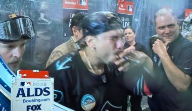 Josh Naylor celebrating the ALDS win in a Kraken sweater!