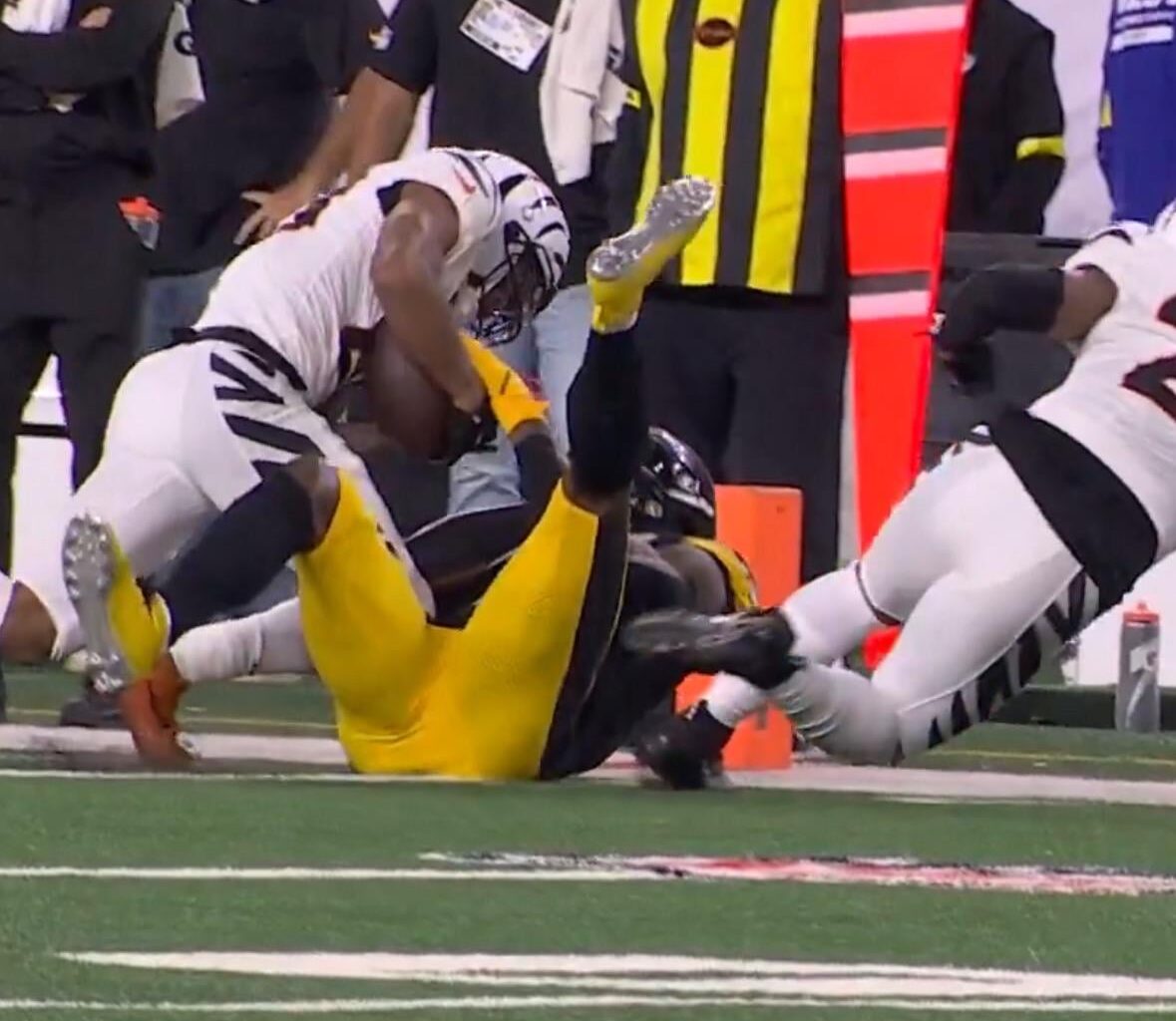 I’m confused how this is an INT when it appears DK still has his left hand on the football while he’s touching out of bounds. They took away a fumble return TD from the Steelers in Ireland in the same fashion, but this one is awarded an INT?