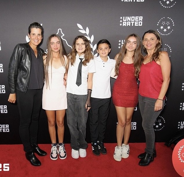 Pictured left to right: Her mom Zulmary, CJ, Juliet (11), Julian (11), Carly (14), and mom Melanie