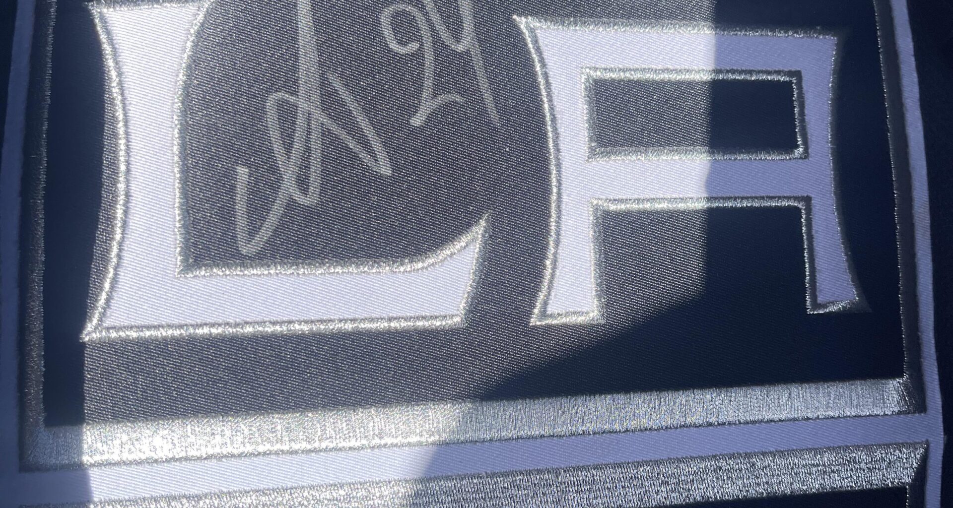 Who’s signature is this?