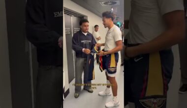 Isaac Quaynor locks down the first ever Pelicans Poole jersey.