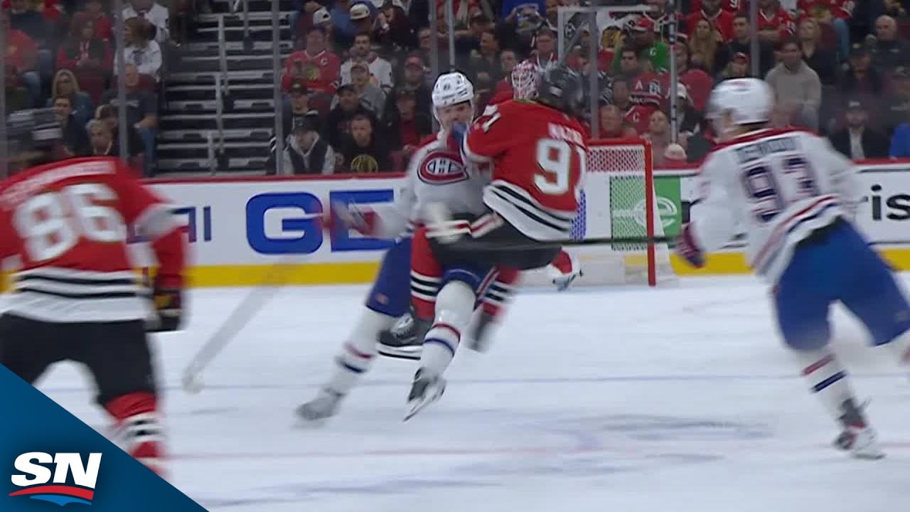 Canadiens' Kaiden Guhle lays massive ice on Blackhawks' Frank Nazar, leading to fights