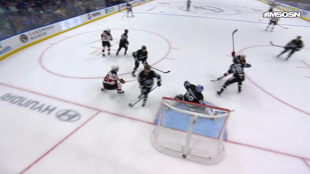 Nico Hischier scores a goal against the Tampa Bay Lightning