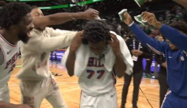 Embiid and 76ers dump water on VJ Edgecombe after scoring 34 points in debut
