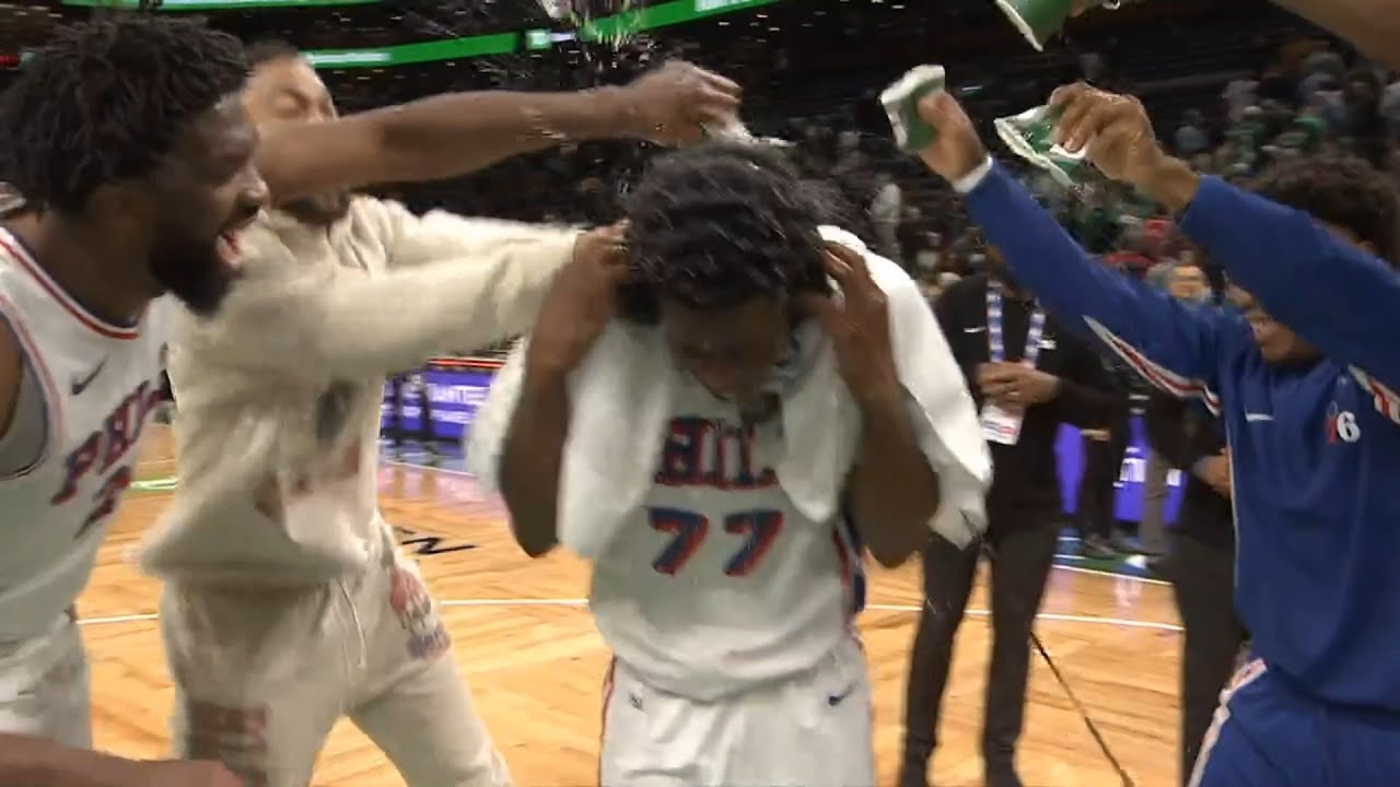 Embiid and 76ers dump water on VJ Edgecombe after scoring 34 points in debut